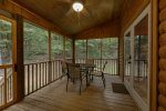 Screened In Porch with Large Hot Tub & Patio Table